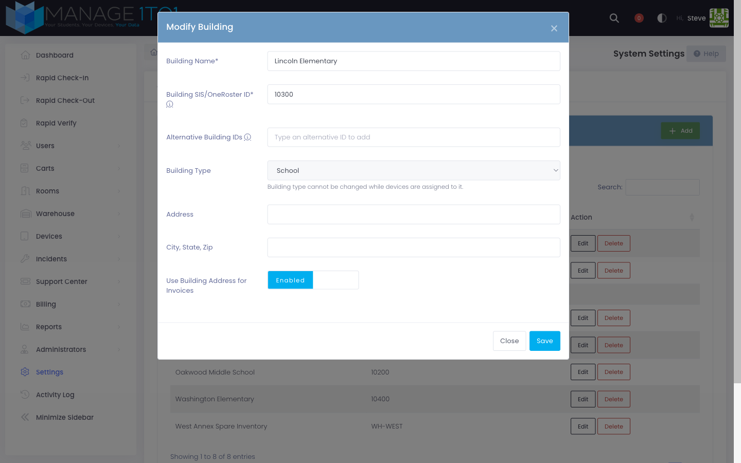 Modify Building modal — Building Type dropdown shows School and Warehouse options on an existing building